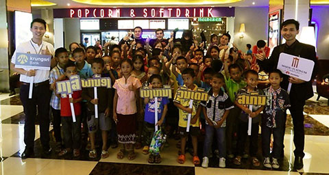 Krungsri Laos taking orphanage kids to the movie